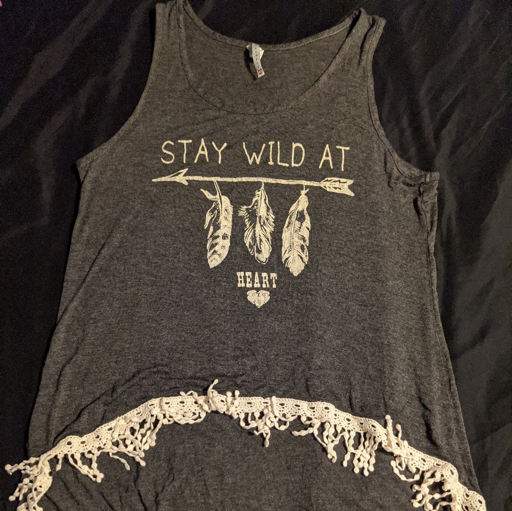 Tank with fringe